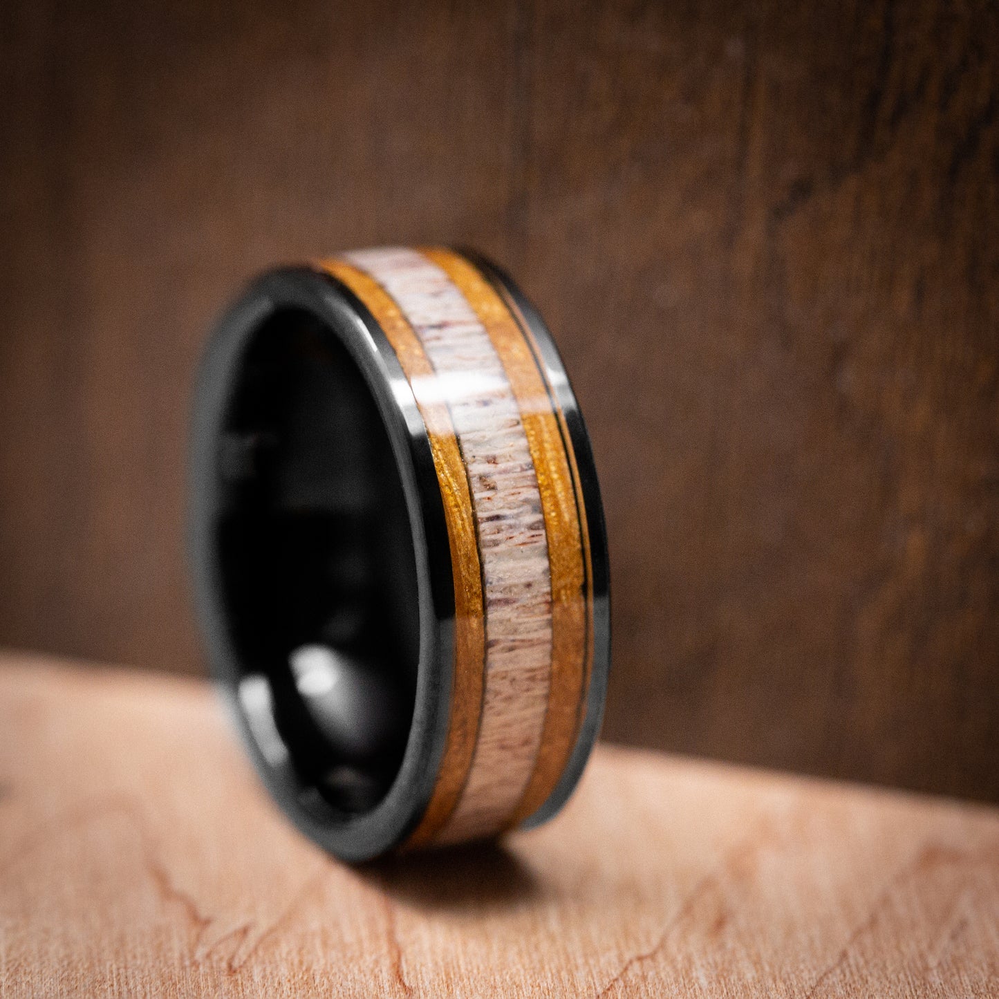 Black Tungsten Ring with Whiskey Barrel Wood and Antler Inlay